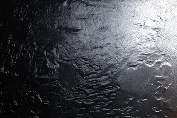 Obraz premium Black glossy metal texture background. Ideal for industrial, luxury, and abstract surface design.