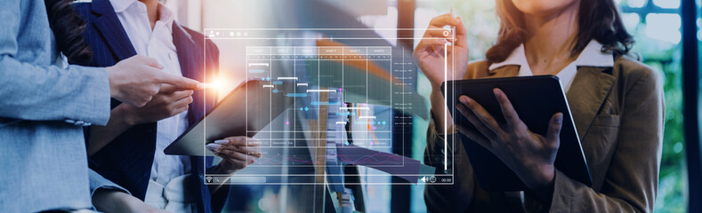 Analyst working with computer in Business Analytics and Data Management System to make report with KPI and metrics connected to database. Corporate strategy for finance, operations, sales, marketing
