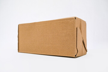Brown cardboard box on a white background