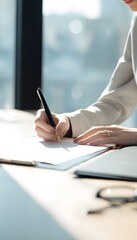 Fototapeta premium Businesswoman Signs Formal Document Bright Modern Office Reflects Professional Legal Corporate Theme Stock Photo