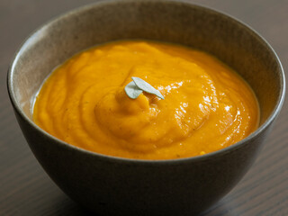 creamy butternut squash pumpkin soup with sage and pumpkin seeds cozy fall dinner