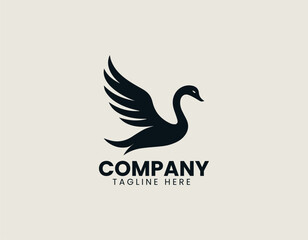 Fototapeta premium Minimal winged flying swan spreading wings gracefully in elegant vector logo design illustration