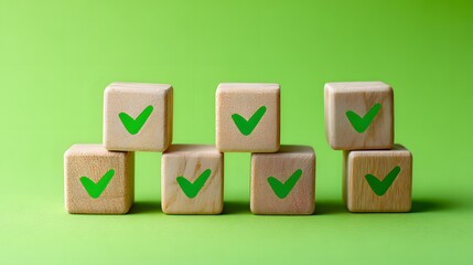 Wooden blocks display green checkmarks, signifying approval and successful completion.
