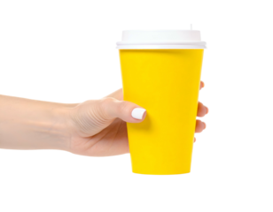 Human hand gripping a yellow paper coffee cup with a white lid, isolated on black background
