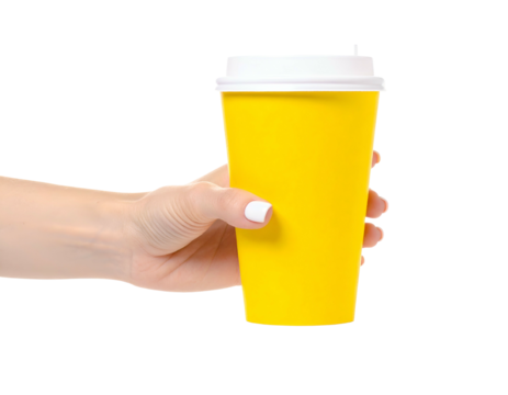 Human hand gripping a yellow paper coffee cup with a white lid, isolated on black background