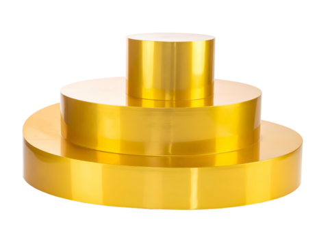 A shiny golden sculpture with circular tiers and a cylinder on top, against black