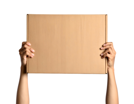 A person's arms hold up a blank cardboard box against a stark, black background - Powered by Adobe