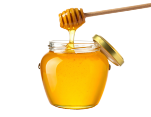 A jar of golden, viscous liquid being drizzled with a wooden dipper