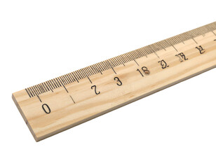 Wooden measuring tool with numbered gradations. Angled view against black background
