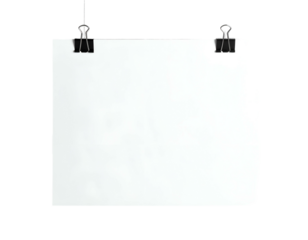 Square white paper held by two binder clips, hung against a pure black backdrop