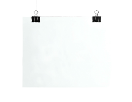 Square white paper held by two binder clips, hung against a pure black backdrop