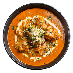Delicious bowl of Chicken Tikka Masala with fresh cilantro and red peppers isolated on transparent background