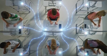 Group of Schoolchildren Intensely Working on Desktop Computers, Linked by Glowing Digital Connections. Kids Engagement in Collaborative Tech Network, Digital Literacy and Future ready Skills. - Powered by Adobe