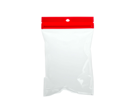 Transparent sealed plastic bag with a red top and a hole. Isolated against a black backdrop