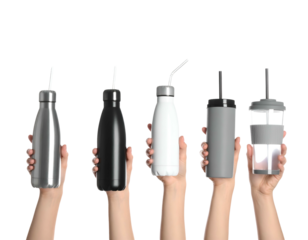 Array of reusable water bottles and travel mugs held up against a black backdrop