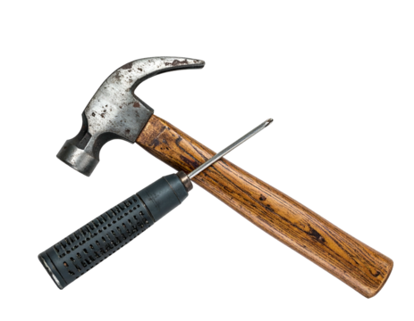 Close-up of a hammer and screwdriver crossed over each other, set against a black background