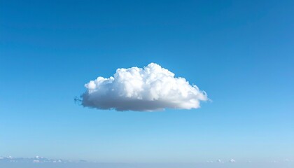 Isolated fluffy white cloud floats serenely in a vast, clear blue sky, evoking feelings of freedom, peace, and infinite possibility for inspiring projects.