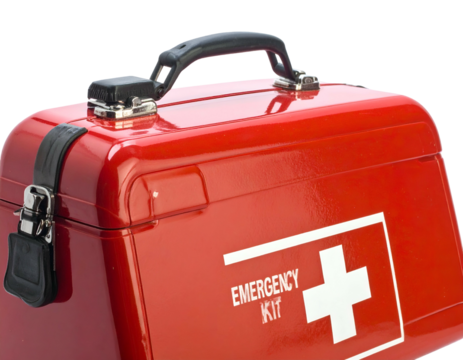 Angled shot of a red metal emergency kit with a white cross and the words "EMERGENCY KIT