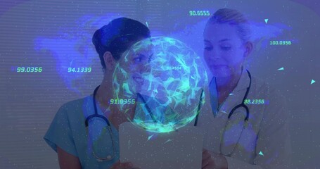 Reviewing scrub nurse and lab coat doctor analyzing tablet data in exam room with holographic globe
