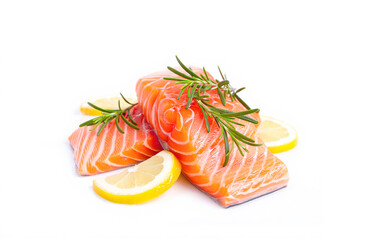 Fresh salmon fillet, spices and lemon slices on white background