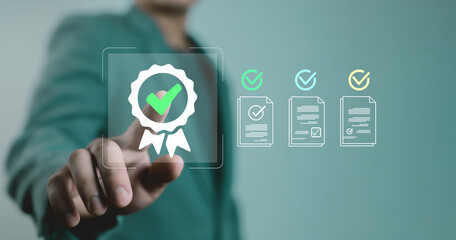 Businessman touching digital certification icon, concept of quality assurance, document approval, standard management, verified process, and business trust in digital technology symbolizing quality