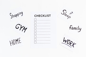 Fototapeta premium Checklist and many paper cards with hand drawing of different life activities, top view. Life balance and planning concept.