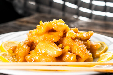 Crispy Lemon Chicken with Sweet and Sour Lemon Sauce - Chinese Style. Chinese cuisine. Food concepts.