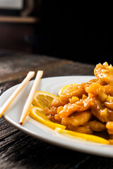 Crispy Lemon Chicken with Sweet and Sour Lemon Sauce - Chinese Style. Chinese cuisine. Food concepts.