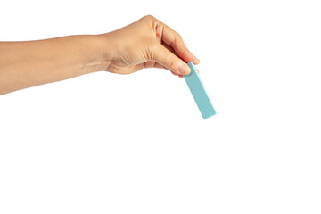 Paper stickers in hand. Hand holding a green sticker. Notes for the message on transparent background.