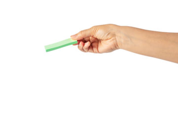 Paper stickers in hand. Hand holding a green sticker. Notes for the message on transparent background.