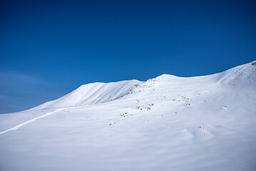 Winter landscape of the Caucasus Mountains in Gudauri, Georgia.