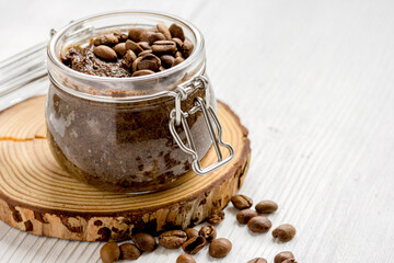 jar coffee-chocolate scrub on wooden table