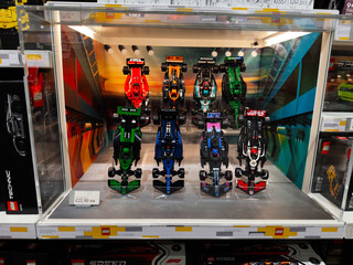 Naklejka premium Colorful Lego Formula One race car display in a store exhibit for collectors and kids