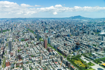 Bird-eye view of Taipei urban architecture landscape from the Taipei 101 Observation Deck, Taiwan. Such as the Taipei Dome, Sun Yat-sen Memorial Hall, and skyscrapers etc.