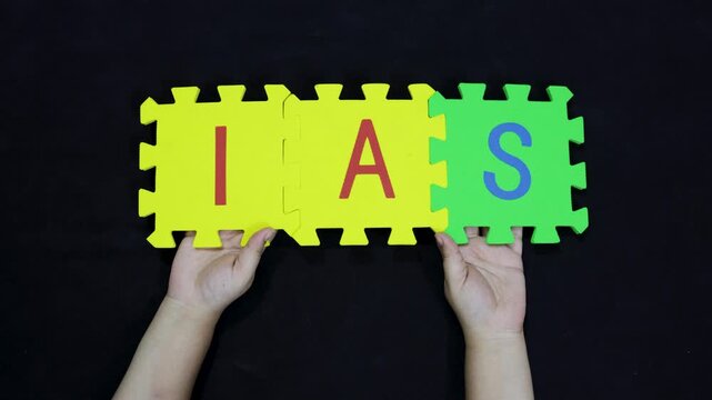government and civil service career word ias on puzzle pieces