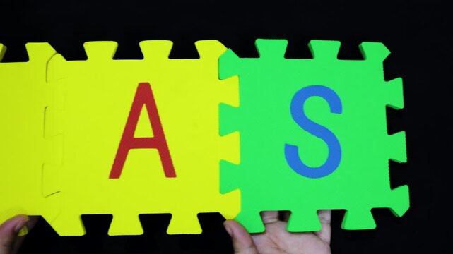education and career aspiration foam jigsaw letters i a s held up