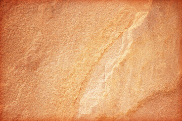 A macro closeup of an old brown leather surface with a rough texture and grunge pattern