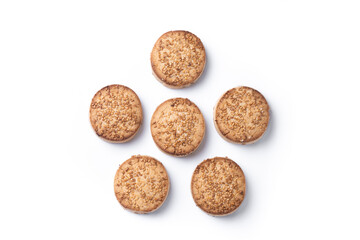 Traditional Spanish mantecados dessert or Christmas shortbread cookies isolated on white background