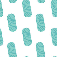 Decorative seamless pattern with blue yarn balls. Textile background for knitting crafts, handmade projects and cozy creative design.