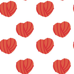 Red yarn shaped like hearts arranged in seamless pattern for textile, fabric design and handmade decoration.