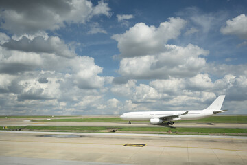 White airplane runway airport transportation travel sky cloud landscape day aviation