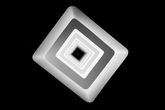 Abstract top-down view of staircase forming perfect square spiral, high shadow contrast, recursive visual loop