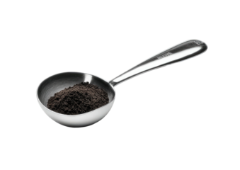 Metal scoop filled with dark ground coffee
