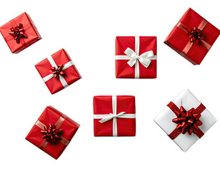 Overhead shot featuring assortment of wrapped gifts with ribbons on a black background