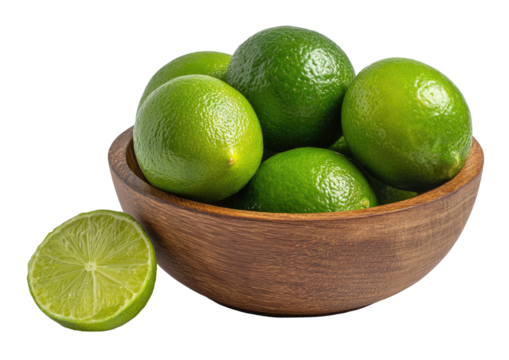 Limes in bowl, vibrant green, cut lime slice detail