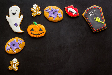Obraz premium Sweets for Halloween party. Funny gingerbread biscuits top view