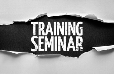 Torn paper revealing the words TRAINING SEMINAR in bold distressed typography on a textured background, representing organized learning events, professional education, and skill improvement programs