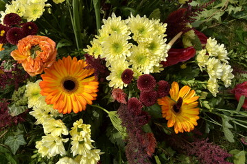 Autumn bouquet, yellow, orange and red flowers.