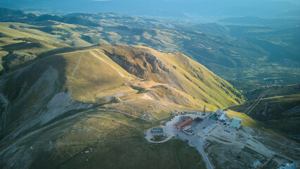 Aerial drone footage of the Astronomical Observatory of Abruzzo at Campo Imperatore, set against majestic mountain landscapes