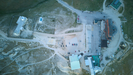 Aerial drone footage of the Astronomical Observatory of Abruzzo at Campo Imperatore, set against majestic mountain landscapes
